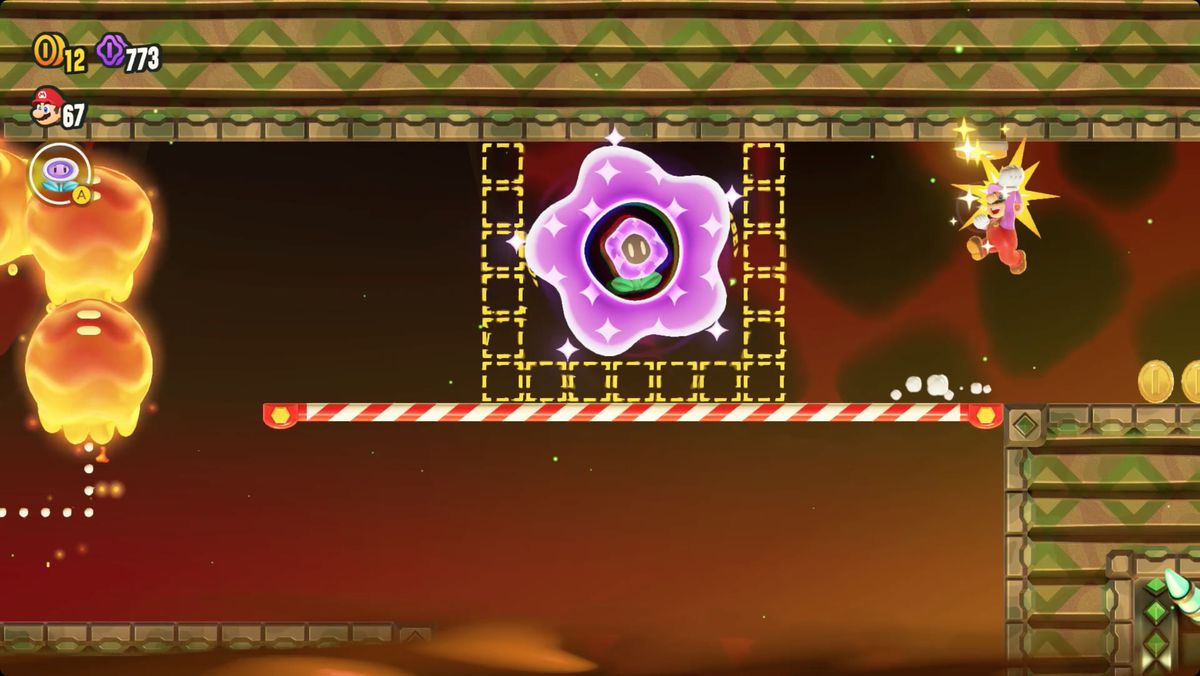 Super Mario Bros. Wonder Deep Magma Bog Flying Battleship screenshot showing the Wonder Flower location.