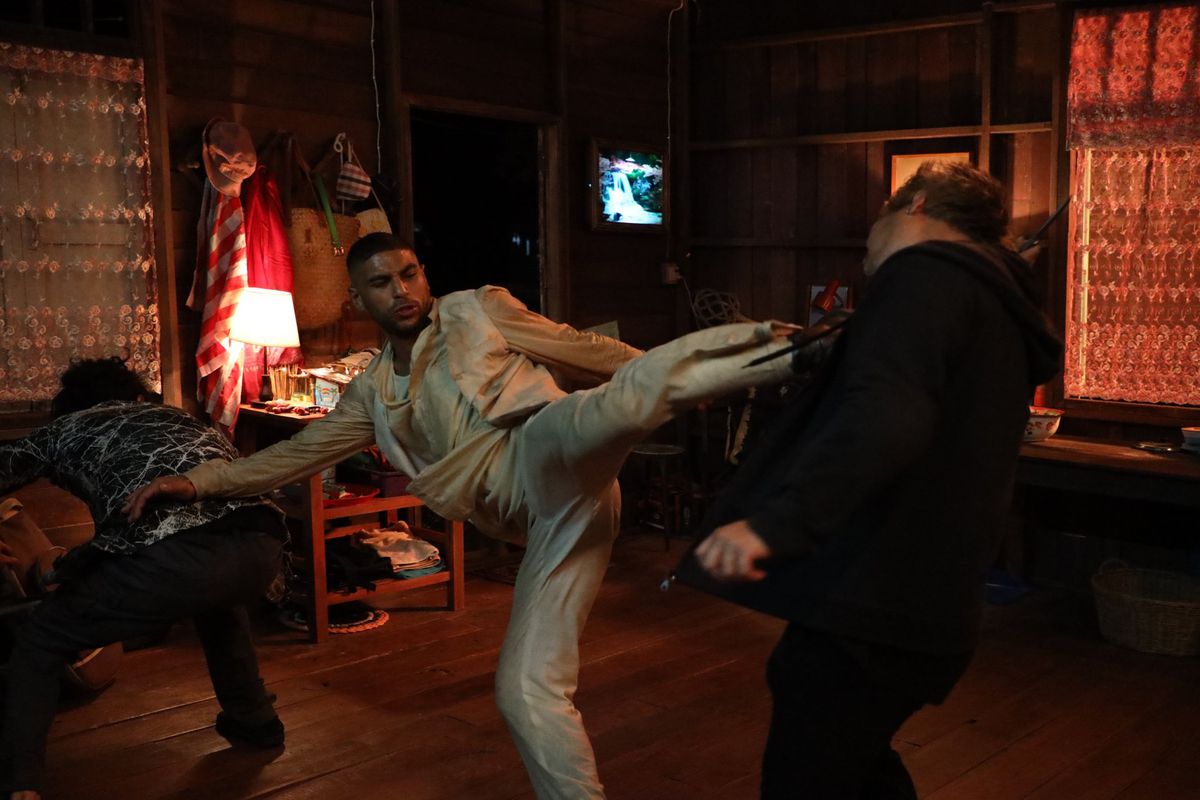 Nassim Lyes as Sam, an ex-con and former martial artist, fighting against two men in Mayhem.